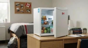 A portable mini fridge for dorm room resting on a kitchen counter, holding beverages and skincare products.